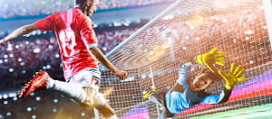 Un calciatore al tiro durante una partita