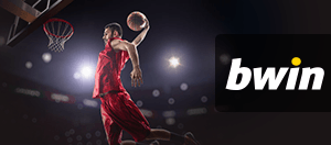 Un giocatore di basket NBA schiaccia a canestro, vicino al logo di bwin