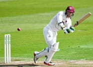 Un giocatore di cricket in azione