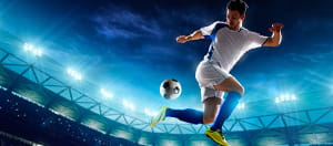 Un calciatore in acrobazia
