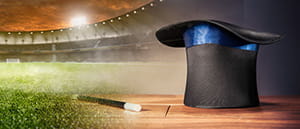 Uno stadio da calcio, un cappello a cilindro e una bacchetta magica