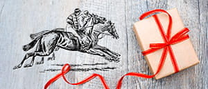 L'immagine di un cavallo e di un pacco regale per dare l'idea di bonus scommesse sull'ippica
