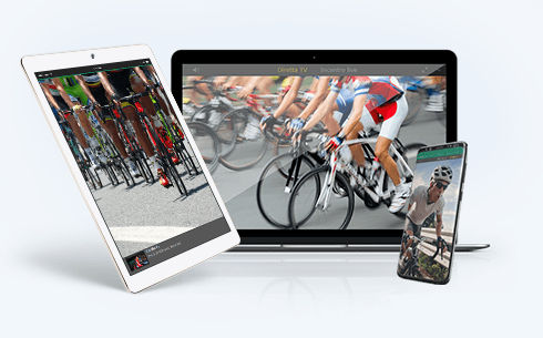 Un laptop, uno smartphone e un tablet connessi ad un sito di scommesse con live streaming di ciclismo