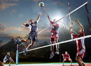 Due squadre di pallavolo impegnate in un match