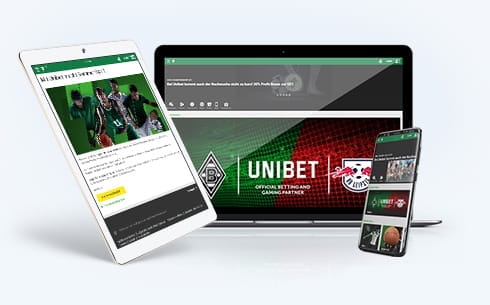 Un laptop, uno smartphone e un tablet connessi ad un sito di scommesse con live streaming di ciclismo