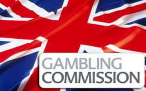 Il logo della Gambling Commission con la bandiera del Regno Unito sullo sfondo