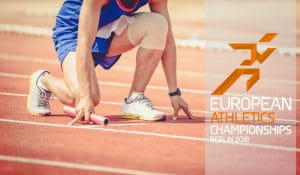 Un corridore ai blocchi di partenza su una pista di atletica e il logo dei Campionati Europei Berlino 2018