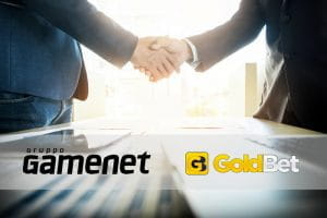 Stretta di mano per accordo acquisizione Gamenet-Goldbet