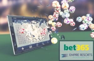 Tavolo da gioco, tablet da cui escono palloni, logo Bet365, logo Empire Resorts