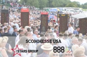 I loghi di The Stars Group e 888 Holdings, con una folla di scommettitori e di bookmaker all'aperto in occasione di una manifestazione sportiva