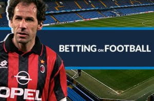 Franco Baresi, storico giocatore del Milan, e il logo di Betting on Football. Sullo sfondo lo stadio di Stamford Bridge a Londra