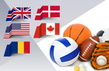 Dei palloni da basket, pallavolo, football americano, delle palline da ping pong e una palla da baseball in un guantone, con le bandiere di Stati Uniti, Regno Unito. Danimarca, Canada e Romania