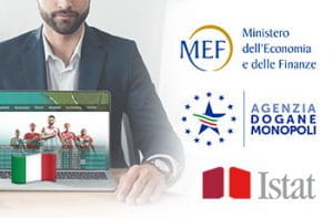 Un uomo mostra un laptop su cui sono alcuni atleti e la schermata di un sito scommesse, con i loghi del Ministero Economia e Finanze, dell'Agenzia Dogane e Monopoli e dell'Istat