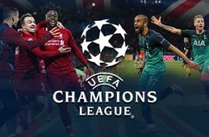 Calciatori di Liverpool e Tottenham esultano dopo aver segnato una rete e il logo della Champions League