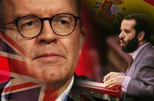 Il vicepresidente del partito laburista britannico, Tom Watson, e Francisco Fernández Marugán, difensore civico spagnolo, sullo sfondo le bandiere di Spagna e Regno Unito.