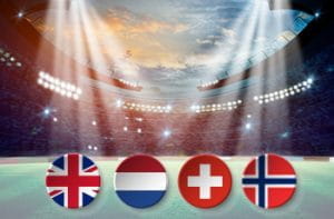 Uno stadio da calcio e le bandiere di Regno Unito, Olanda, Svizzera e Norvegia