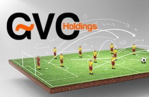 Il logo di GVC Holdings e una riproduzione di calcio giocattolo