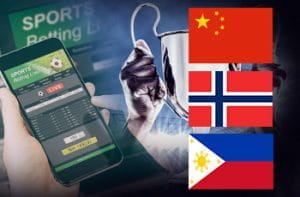 Una coppa, la schermata di un sito scommesse su uno smartphone e le bandiere di Cina, Norvegia e Filippine