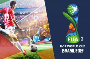 Un calciatore va al tiro e il logo del Mondiale di calcio Under 17