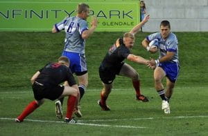 Dei giocatori di rugby in azione