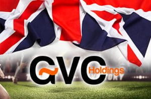 La bandiera del Regno Unito e il logo di GVC Holdings