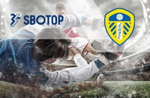 I loghi di SBOTOP, del Leeds United e calciatori in azione durante una partita