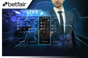 Il logo di Betfair, la schermata di un bookmaker online e un uomo in giacca e cravatta