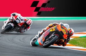 Due moto in gara e il logo della MotoGP