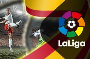 Il logo della Liga, un calciatore in azione e la bandiera spagnola