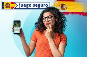 Il logo della DGOJ, ente regolatore del gioco in Spagna, e una ragazza con uno smartphone