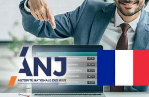 Il logo di ANJ, la bandiera francese e un manager che indica un laptop
