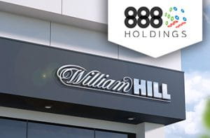 Negozio con insegna William Hill e logo 888 Holdings.