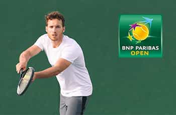 Tennista in azione, logo BNP Paribas Open 2023