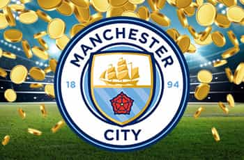 Logo Manchester City e monete d'oro
