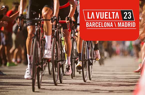 Ciclisti su strada, logo Vuelta 2023