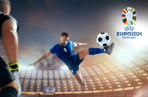 Calciatore in azione, logo Euro 2024