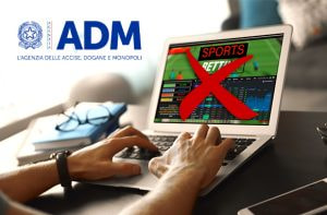 Laptop con sito di scommesse e logo ADM