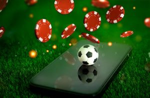 Fiches e pallone da calcio su smartphone