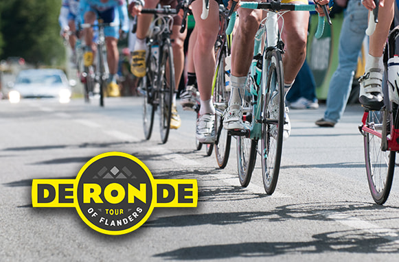 Ciclisti e logo Giro delle Fiandre