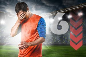 Calciatore con faccia triste, freccia rossa a ribasso