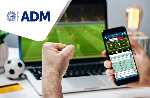 Logo di ADM, tablet acceso e smartphone con sito di scommesse