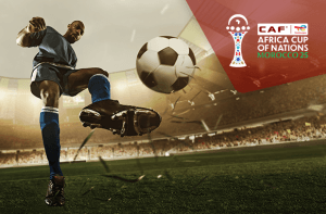 Calciatore in azione e logo della Coppa d'Africa