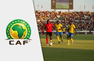 Istantanea di una partita e logo della CAF