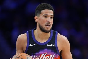 Devin Booker scommette 1 milione sul Super Bowl: la NBA reagisce