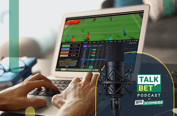 Laptop con sito di scommesse, logo TalkBet