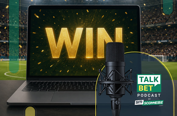 Laptop con scritta Win, logo TalkBet